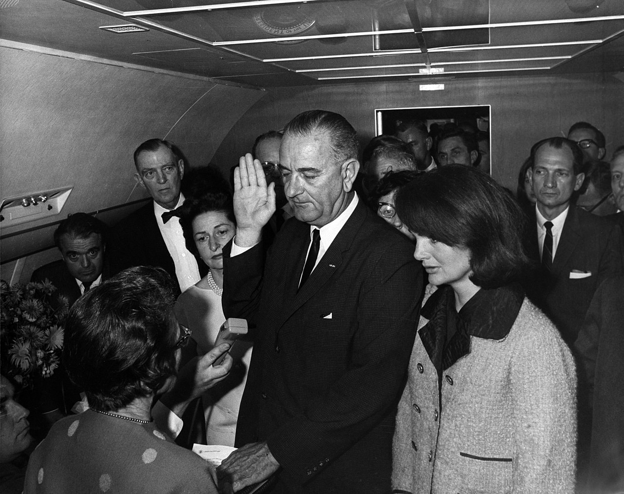 1280px-Lyndon_B._Johnson_taking_the_oath_of_office,_November_1963.jpg